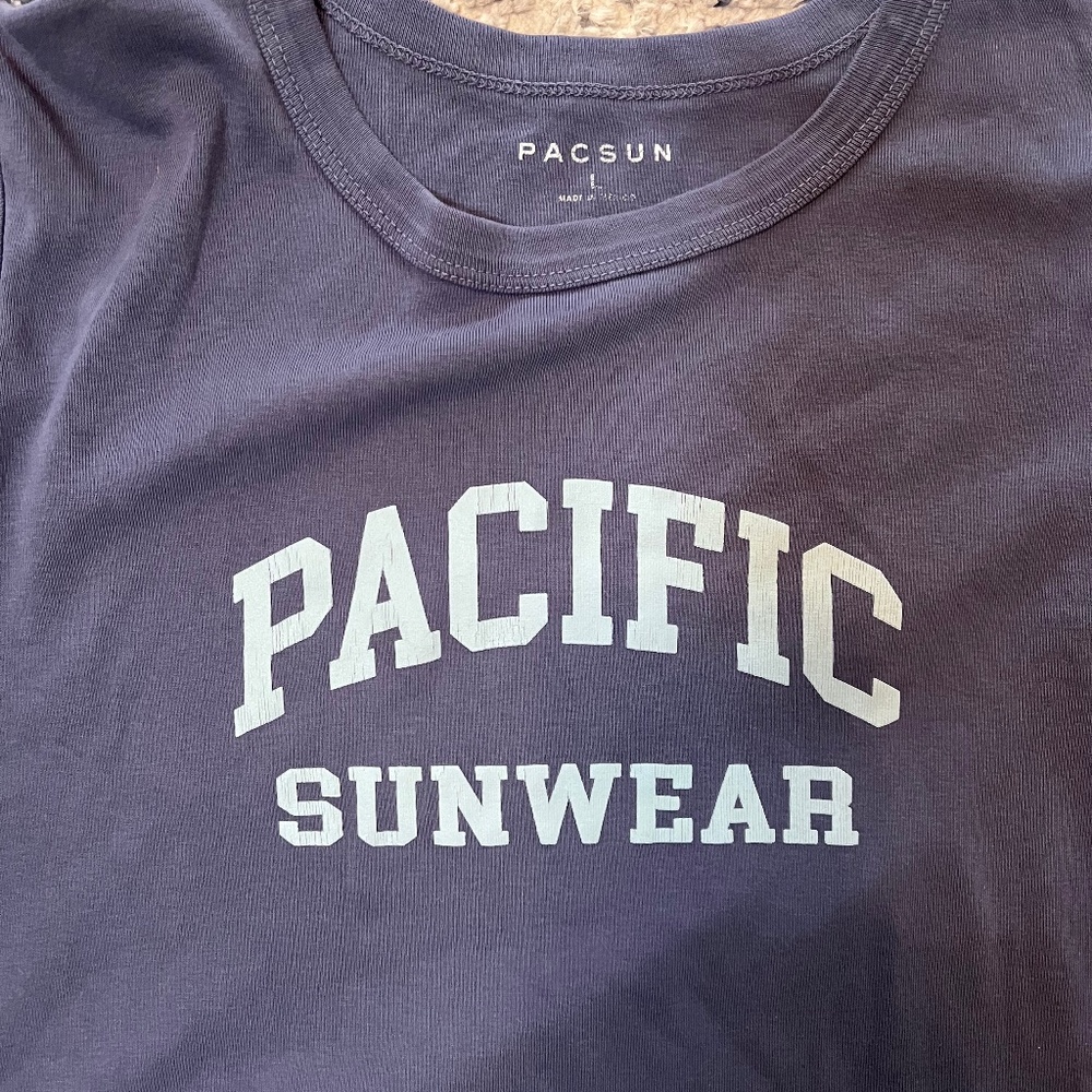 PacSun blue t-shirt with white "Pacific Sunwear" logo